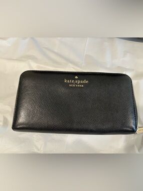 kate spade black zip-around leather wallet with gold logo